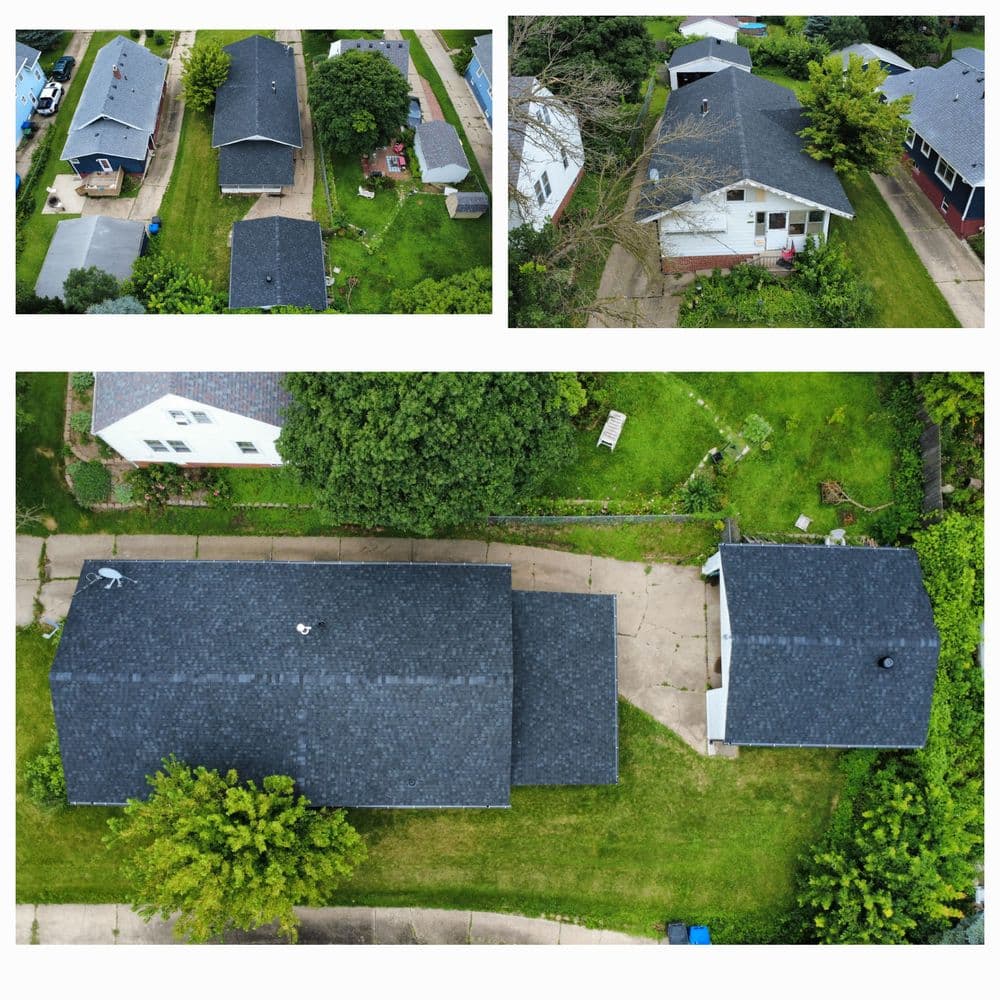 Aerial view of residential neighborhood showcasing multiple houses and green lawns.